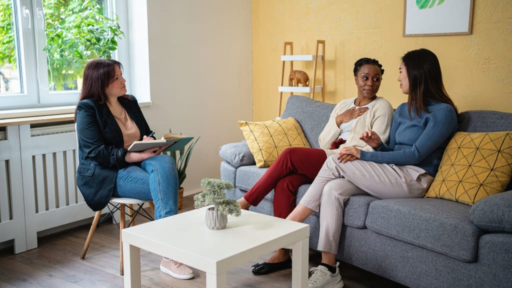 Multiracial lesbian couple at the marriage counseling